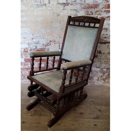 344 - A 19th century American rocker, duck egg blue upholstery c.1880