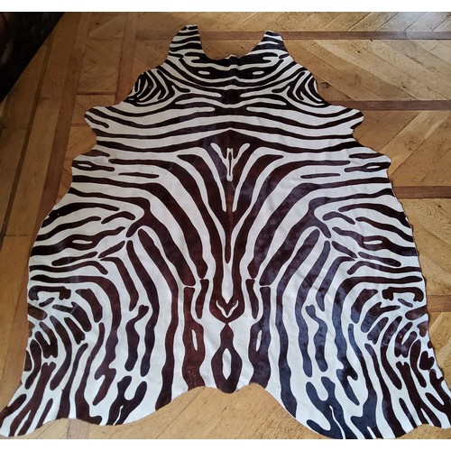 19 - A Zebra skin rug