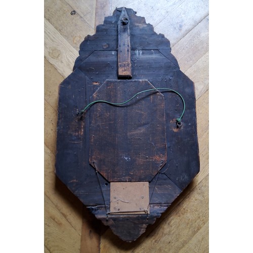 23 - A large 19th century Continental repousse brass cushion frame mirror, planked back93 x 55cm (af)... 