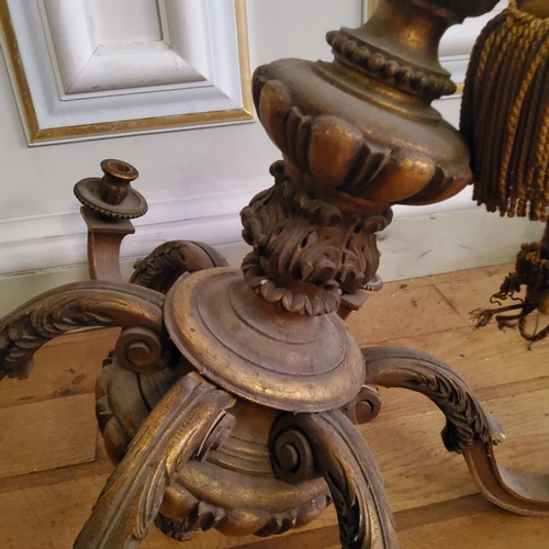 24 - An 18th century style giltwood six branch chandelier, boldlly carved and turned column with bulbous ... 