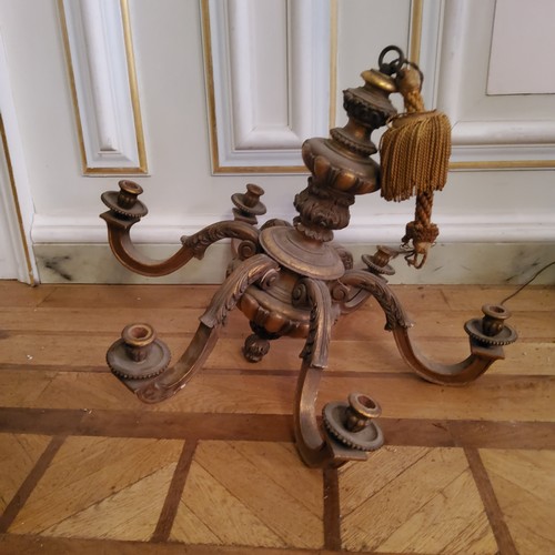 24 - An 18th century style giltwood six branch chandelier, boldlly carved and turned column with bulbous ... 