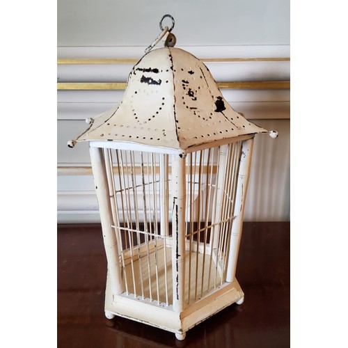 77 - An 'Oriental' hanging birdcage in the form of a lantern 42cms high