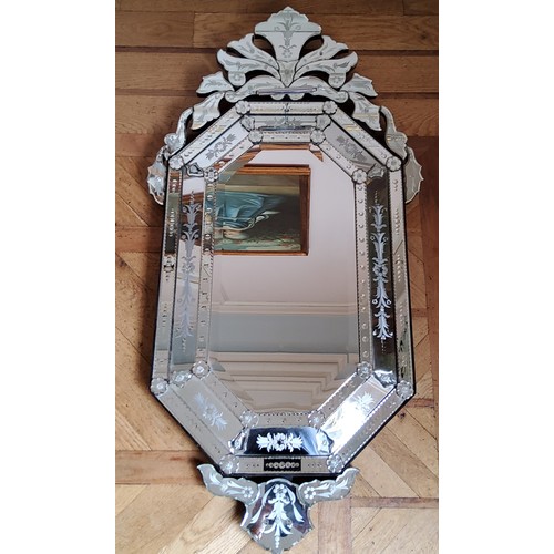 83 - A Venetian style etched octagonal mirror 140 x 72cms