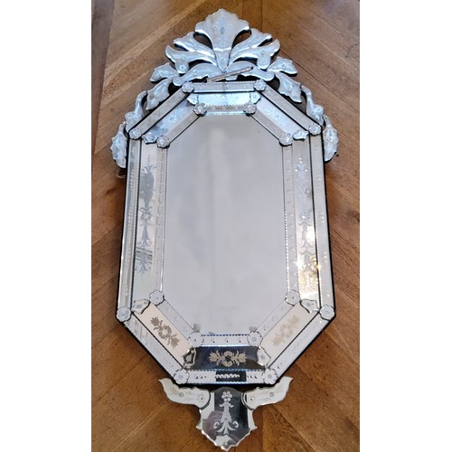 84 - A Venetian style etched octagonal mirror 140 x 72cms