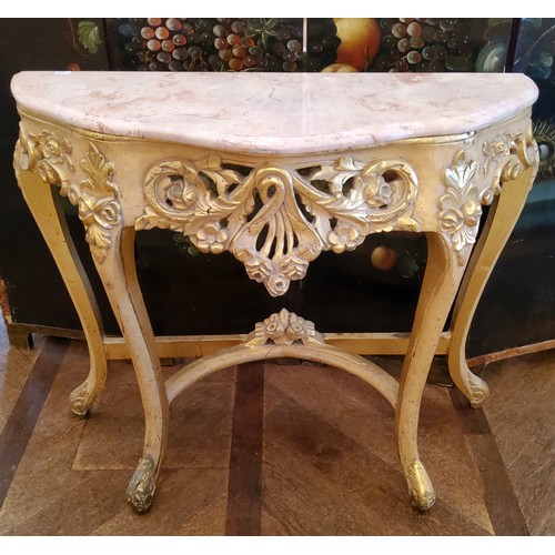 120 - An ornate Louis XVI style 'Roccoco' marble topped gilt wood console, serpentine shaped pink marble s... 