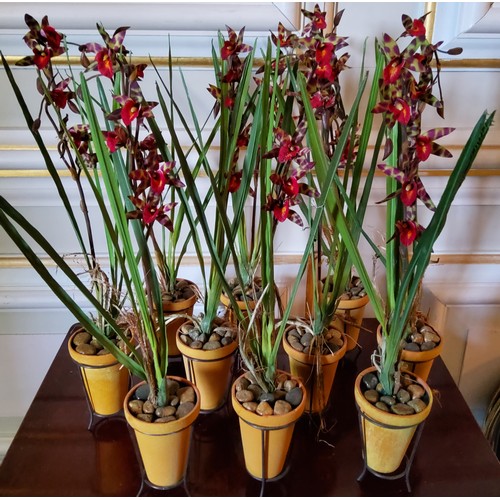 177 - Ten artificial orchid plants in terracotta pots with stands