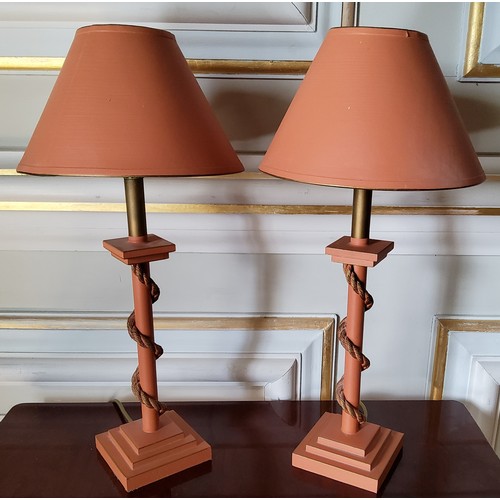 191 - A pair of contemporary painted wood & rope table lamps in tones of terracotta & gold on step... 