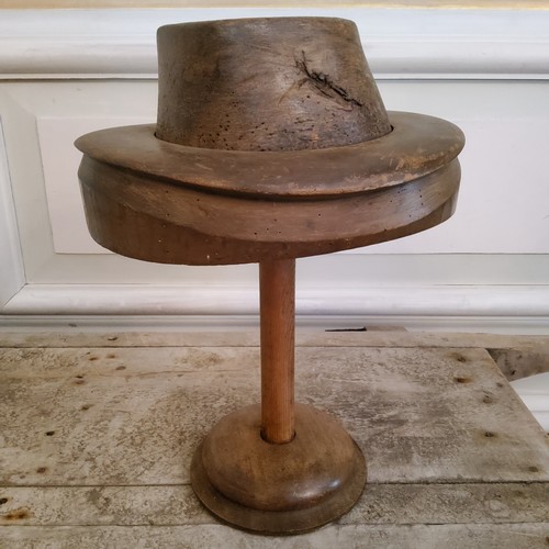 209 - A 19th century French milliners fruit wood bowler hat block on stand