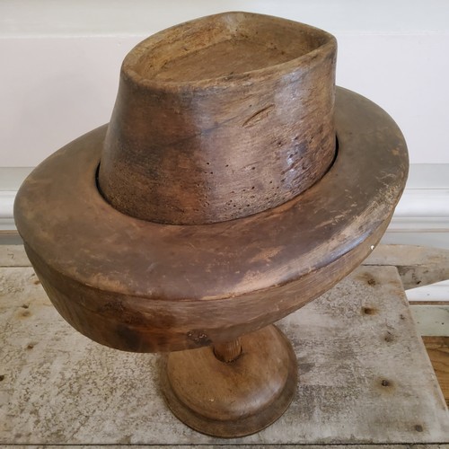 209 - A 19th century French milliners fruit wood bowler hat block on stand