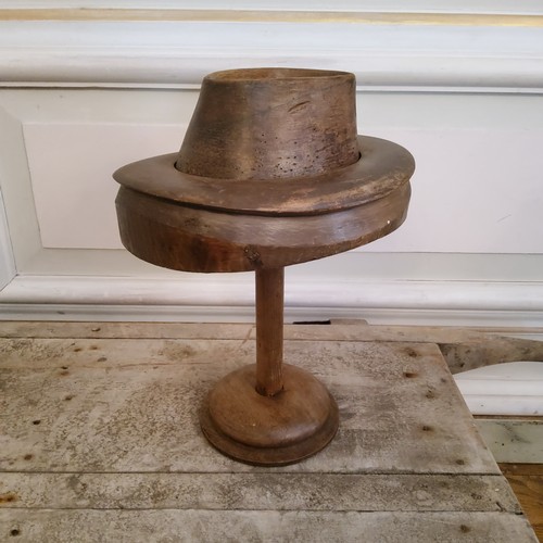 209 - A 19th century French milliners fruit wood bowler hat block on stand