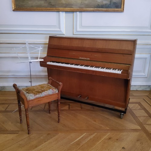 220 - A Zimmerman upright piano, piano stool and music stand (used during wedding celebrations) currently ... 