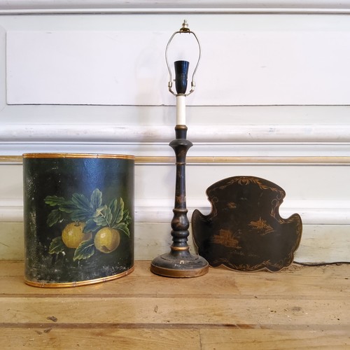 222 - A black lacquered chinoiserie table lamp; a hand painted papier mache waste bucket (2)