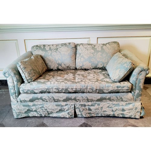 238 - A small country house two seater 'loving seat' sofa with bold floral damask upholstery in tones of s... 