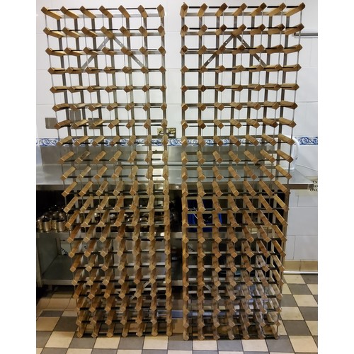 247 - Two 120 bottle wine racks, classic design of wood and steel construction (240 bottle capacity), some... 