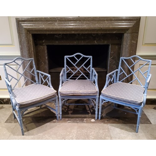 257 - Three 'George III' Chinese Chippendale Revival faux bamboo elbow chairs painted and distressed powde... 