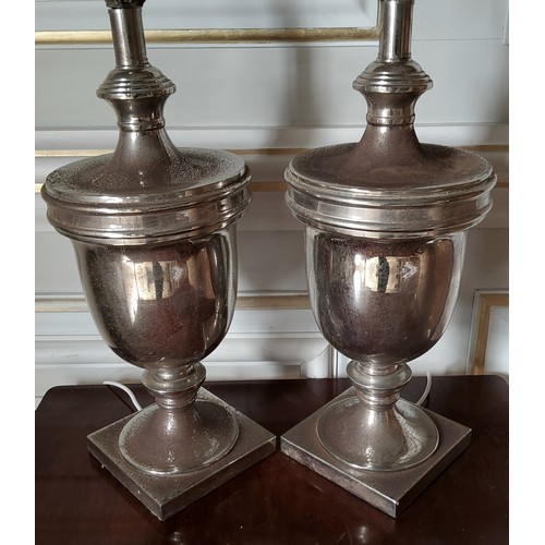 264 - A pair of substantial chrome table lamps in the form of a classical urn 54cms high (af)