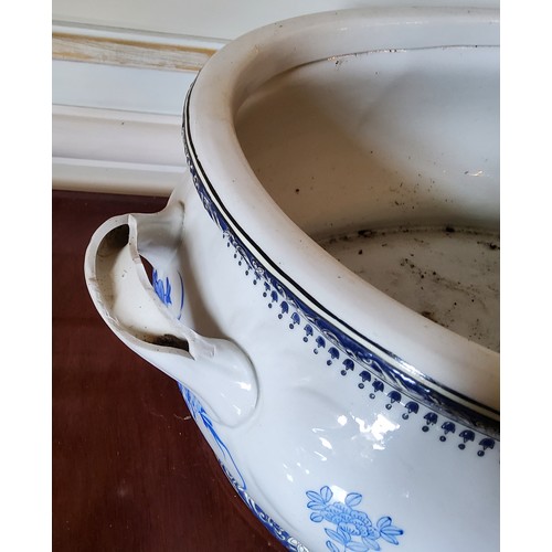 180 - A 19th century French large blue & white two handled ceramic basin decorated with flowers and&nb... 