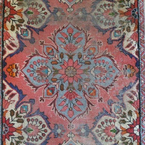 280 - A hand knotted Persian Sarab runner, in tones of turquoise and rich reds, 411cm long x 90cm