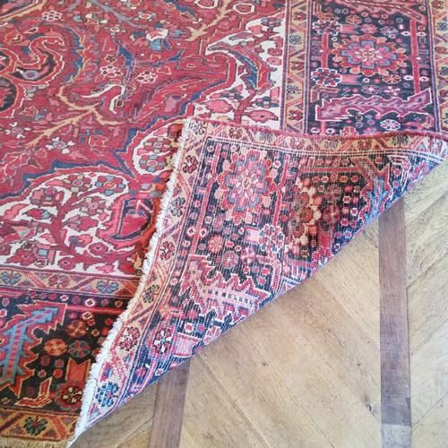 284 - A large hand finished Mashad Persian carpet390cm x 293cm