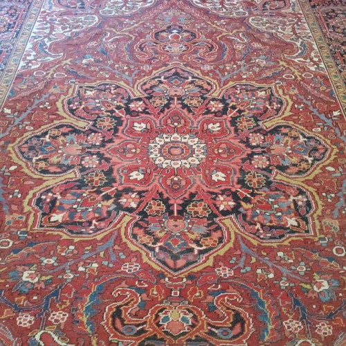 284 - A large hand finished Mashad Persian carpet390cm x 293cm