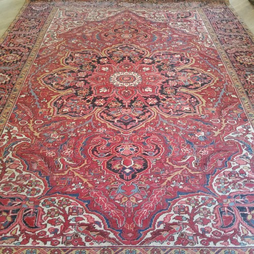 284 - A large hand finished Mashad Persian carpet390cm x 293cm