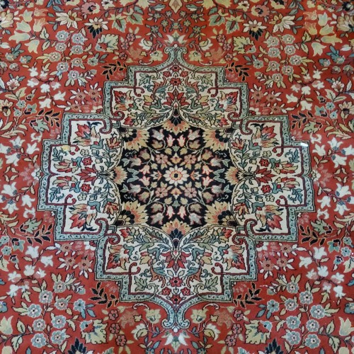 286 - A hand finished Persian Keshan rug