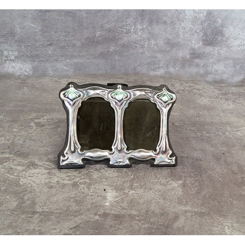 37 - A silver Art Nouveau double picture frame, stamped sterling