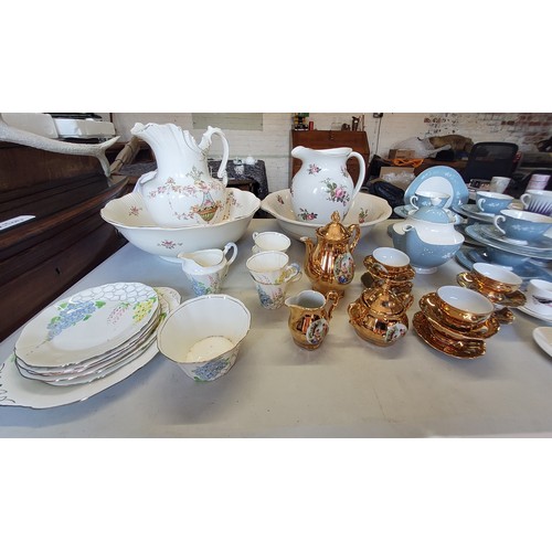 235 - Decorative Ceramics- a Doulton Reflection pattern six piece tea set; Bavarian solid gold band tea se... 