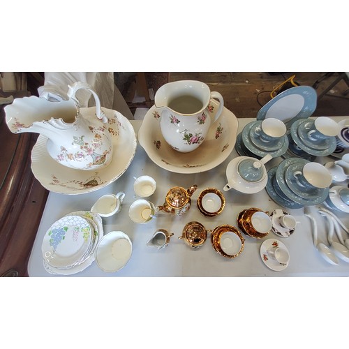 235 - Decorative Ceramics- a Doulton Reflection pattern six piece tea set; Bavarian solid gold band tea se... 