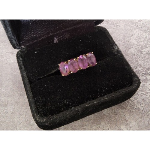 20 - A 9ct gold wedding band 3.17g; a 9ct gold ring set with four oval purple amethysts 3.55g; a 9ct gold... 