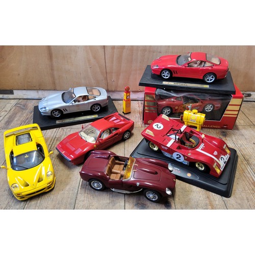 250 - A Maisto 1/18 scale Ferrari 550 Maranello, red, tan interior; another silver, tan interior; an F50, ... 