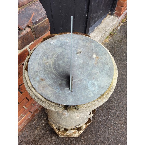 301 - Stone effect concrete sundial 114 heigh , bronze dial approx 14 cm heigh, diameter base 40cm top 34c... 