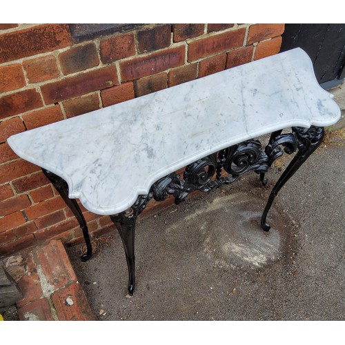 306 - Black cast iron table with white marble top