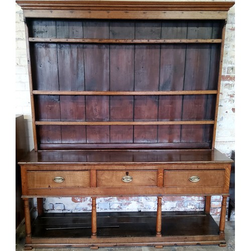 A III kitchen dresser with three long cock beaded drawers to