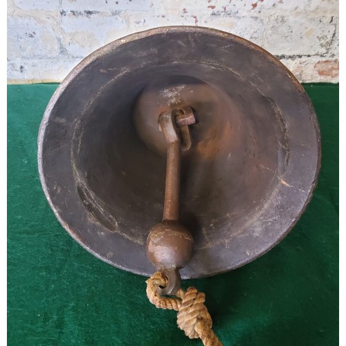 7 - A George V bronze ships bell with roped clapper, early 20th century. Height 28cm x diameter 24c... 