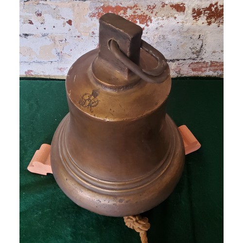 7 - A George V bronze ships bell with roped clapper, early 20th century. Height 28cm x diameter 24c... 