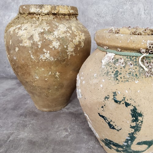 13 - Interior Design - Eastern 'shipwreck' pottery vessels, encrusted with remnants of crustacean exposur... 