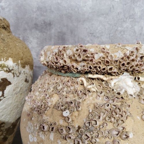 13 - Interior Design - Eastern 'shipwreck' pottery vessels, encrusted with remnants of crustacean exposur... 