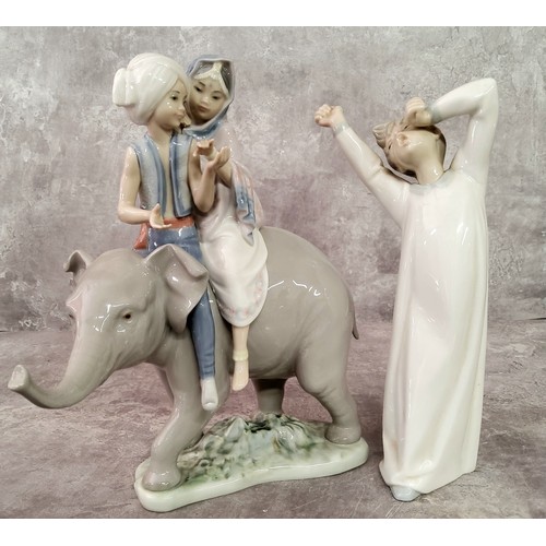 26 - Lladro gloss finish porcelain figurine of Indian children seated on an elephant; another Bedtime