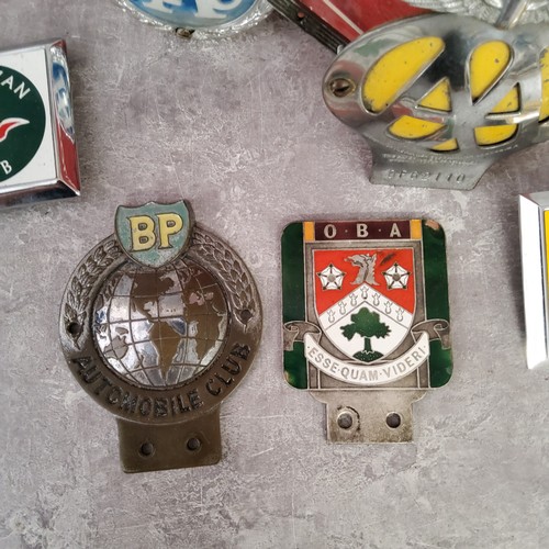 45 - Automobilia - three vintage radiator badges including a BP Automobile Club, an enamel Ashville Colle... 