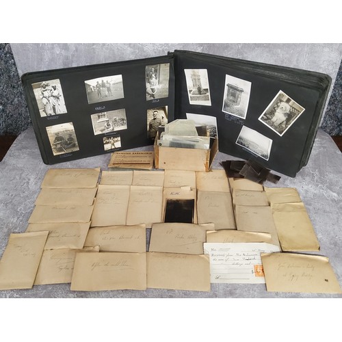 58 - Photography - a photograph album containing military interest examples, local Interest, postcards, e... 