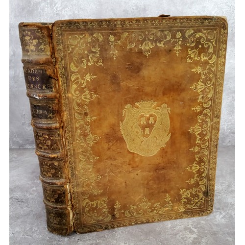 61 - An unusual early 18th century French decorative leather bound book with hidden compartment made out ... 