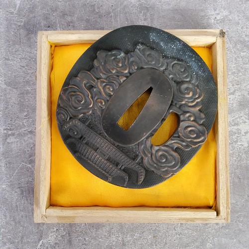 71 - A Japanese Masahiro bronze tsuba