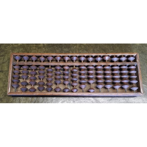 84 - An early 20th century Chinese padouk wood abacus 33cm wide