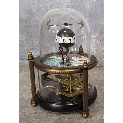 90 - A brass novelty automaton table clock, as fish in a bowl, central posted globular dial with Arabic n... 