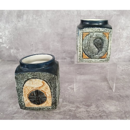 121 - A pair of Troika Pottery marmalade pots decorated by Linda Hazel with incised and painted abstract d... 