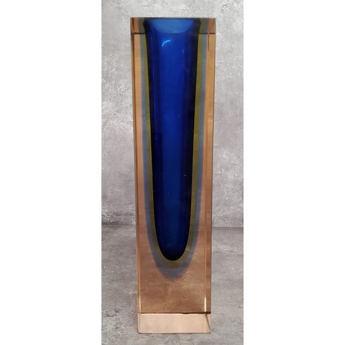 128 - A bold mid century rectangular coloured glass vase, four uniformed coloured glass bands set within a... 