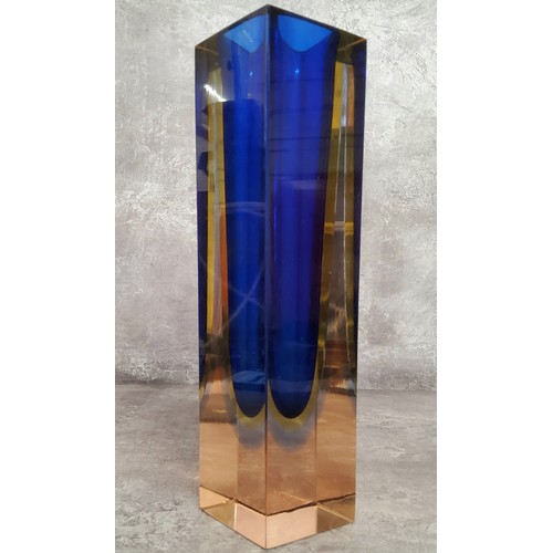 128 - A bold mid century rectangular coloured glass vase, four uniformed coloured glass bands set within a... 