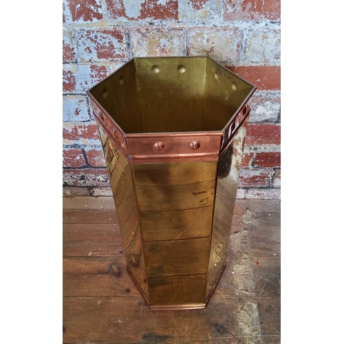 141 - An early 20th century hexagonal brass umbrella standHeight 51cm x diameter 23cm