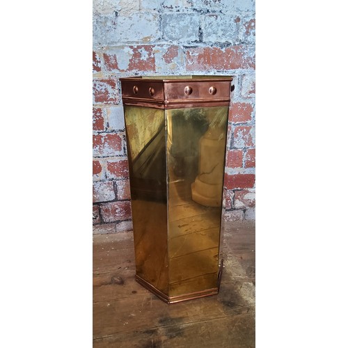 141 - An early 20th century hexagonal brass umbrella standHeight 51cm x diameter 23cm